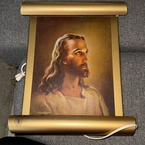 Head of Jesus by Warner Sallman in lighted metal frame